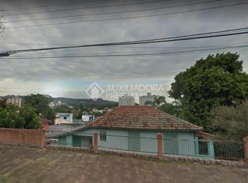 375149_iEa8B9A9KG8_375149629a5a481128f.jpg · Terreno de esquina com 242 m² de área total no Bairro Partenon em Porto Alegre