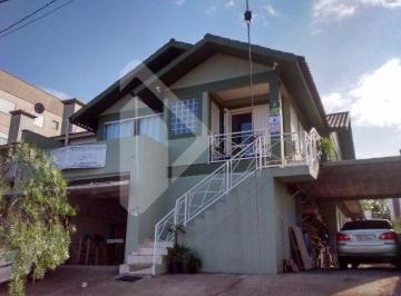 192295_iw2Qo92n1757E0UHpFK_192295573da8f31a3f0.jpg · Casa com 04 dormitórios 01 suíte à venda - Bairro Montanha - Lajeado/RS