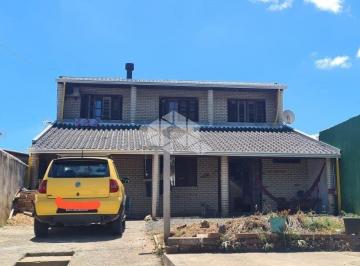496228_ia6Sci6_49622865a01a13152df.jpg · Sobrado á venda com 3 dormitórios e suíte, 353m² de área com piscina  em Sapucaia