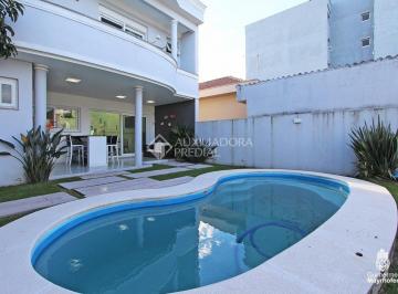 351389_ieN07_3513896154cd368508d.jpg · Diferenciado sobrado, construção moderna com 3 suítes e piscina