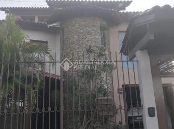 46463_i26btl10_4646361b8de175c8e2.jpg · Sobrado mobiliado no centro de São Leopoldo, podendo ser residencial ou comercial, jardim frente e f