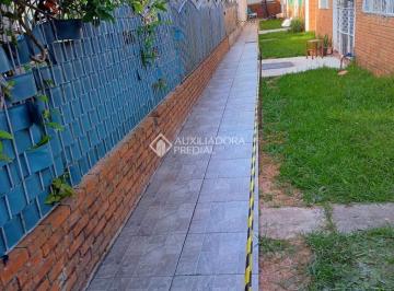 FIRMINA 1 · Terreno com 4 Casas no bairro Partenon