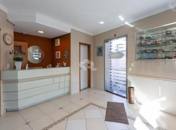 Andar inferior - comercial: Recepção · Excelente casa de esquina residencial/comercial no bairro Higienópolis, 50 m da Assis Brasil