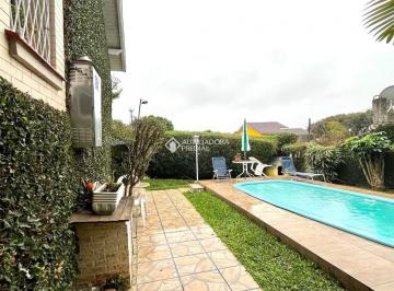 424023_iTA4Ndkjg36A5c322bh_424023649f1e411652e.jpg · Casa com três quartos e 3 vagas no Bairro Jardim Medianeira