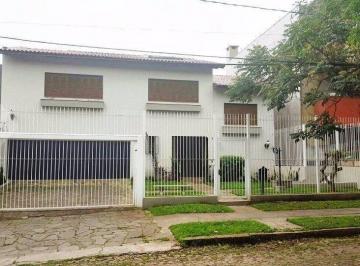 01 - fachada · Casa de 4 quartos com 2 suites e 4 vagas de garagem no bairro Vila Assunção.