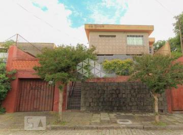 218698_i3r4e77_218698624af448da7ab.jpg · Casa,Terreno medindo 13 M² de frente por 77 M² de frente a fundos no bairro Partenon em Porto Alegre