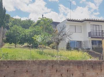 330770_i4378i2j1_3307706005dcf7124b6.jpg · Terreno em aclive acima do nível da rua no Bairro Primavera, frente para sol da manhã