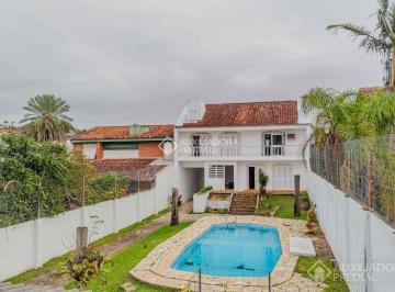 383302_iQ51iIg6N6G99aDCi2_38330268949deb16270.jpg · Casa de 3 dormitórios com pátio e piscina no bairro Cristal