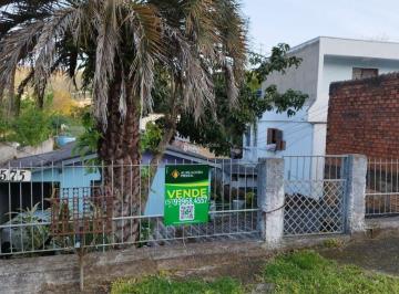 437494_i064ZpQ_43749464d58f9d167f4.jpg · Terreno de 680 m² com 2 casas em avenida tranquila