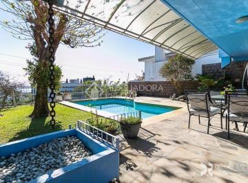 292017_iei8d7m_292017613f4d5c4ad95.jpg · Casa alto padrão com vista para o rio Guaíba