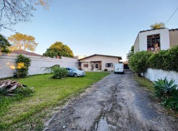 243139_iL887u58sWY_24313962e17654e4602.jpg · Casa com 4 dormitórios, são 2 terrenos, no bairro Nossa Senhora das Graças/Canoas.