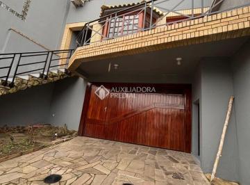 Entrada Garagem · Casa com três dormitorios, vagas de garagem, churrasqueira e vista