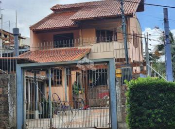 497876_i146Y48G1hXuz_49787665b14d4295551.jpg · Casa sobrado, com 4 quartos, no bairro Teresópolis, Porto Alegre