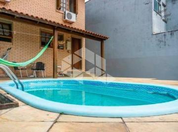 206350_i2Qe3dStNm7zz_206350613bd24e8ec49.jpg · Casa com 03 dormitórios e Piscina no bairro Morro Santana