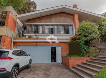 507001_iPSZSe32bZm_50700165ddac2a0b031.jpg · Casa comercial 3 dormítorios no Bairro Tres Figueiras, em Porto Alegre