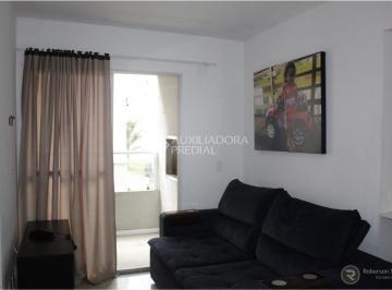 Sala de estar com churrasqueira · Apartamento de 2 dormitórios com suite e banho social, de 56m²