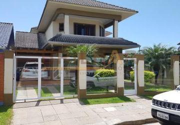 fe04ee2d0c8d734d4c3000e52433501115891491.jpg · Casa 3 dormitórios  comprar em Arroio do Sal