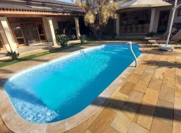 e7yromm2nwuymzjimgjhndhj_md · Casa Térrea em Indaiatuba, Condomínio Portal dos Ipês com 3 suítes - 330 m²
