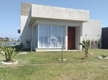 308557_i0NfMJG472o3_3085576425c30eb9f29.jpg · Casa à venda, com 3 quartos/dormitórios, 1 vaga/box, no condomínio Riviera, Xangri-lá/RS