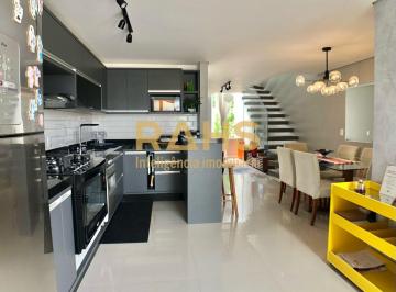 Foto · Sobrado Geminado com 115 m² de área construída com 1 suíte e 2 quartos, 2 vagas de garagem edícula c