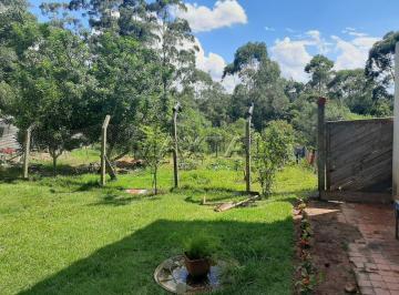 Terreno · 1500m² · Terreno com 1.500m², possui 2 casas no terreno, poço artesiano, pomar.