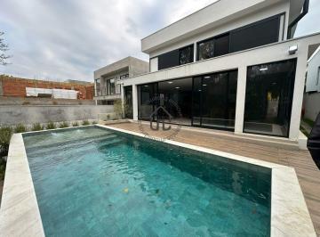 piscina · Casa à venda no Condomínio Morada do Bosque.