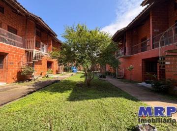 Foto 16 · Apartamento à venda na Praia do Sapê em Ubatuba. Com portaria 24 horas e piscina