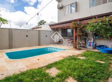 321883_i88FD3w3HG2_3218836717a5fd09228.jpg · Casa 5 dormitórios com piscina, área de churrasqueira.