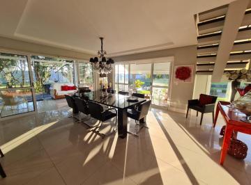 645005_i8z42YO28qKSnpg61Kj_64500566f45c054085f.jpg · Sobrado 4 suítes, living 3 ambientes, pé direito duplo, com pátio beira lago, no condomínio Bosques 