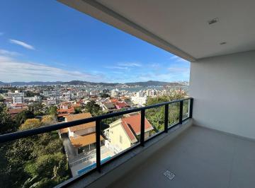 0d0bc1838a865cfb9c8bd77ada606eb7614e6b3a · Apartamento com 3 suítes e 3 vagas de garagem em Coqueiros, Florianópolis.