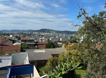 d07e3e8fe634f9c116806ca8af744e43be09df34 · Apartamento com 3 quartos e sacada com churrasqueira - Bairro Coqueiros, em Florianópolis.