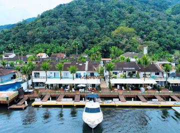 4e7c025c5ae56fc44a4aebb2d7a4a5ada3e5c948 · Casa com 4 dormitórios à venda, 200 m² por R$ 3.900.000,00 - Marina Del Rey - Guarujá/SP