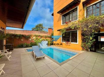 423466fd8bfa8fe689e17fa6e33f1f54d6151c0f · Casa à venda no Guaiuba no Guarujá | Omega Imóveis