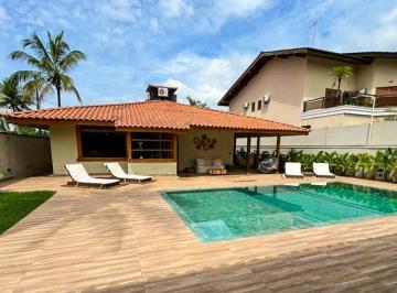 Casa · 320m² · 4 Quartos · 4 Vagas · Casa térrea nova à venda no Condomínio Jardim Acapulco na praia do Guarujá