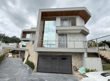 1 · Casa de 302m² com 4 suítes em Cacupé