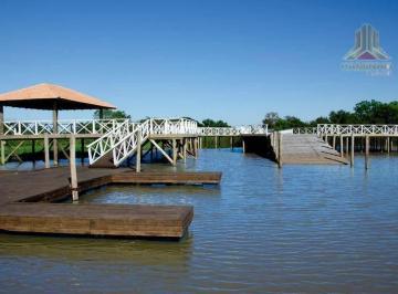 04a0aff860f0dcb445b2fd9e11298c21308bb34b · Vendo terreno em frente ao lago no Condomínio Ilhas Park Eldorado