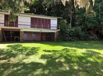 59a81de2eaa7ac51964383ad93e6a6d0cd20e5db · Vendo casa construída em meio a muito verde, natureza e acesso direto ao Guaíba, em Porto Alegre