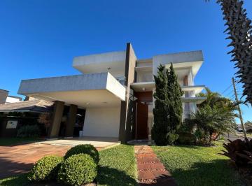 Casa · 282m² · 4 Quartos · 2 Vagas · Sobrado de esquina com 4 suítes, living 3 ambientes, pè direito alto, no condomínio Quintas do Lago