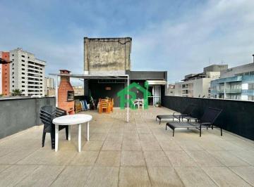 Solarium · Cobertura ampla, 2 dormitórios (1 suíte), 1 vaga, Enseada, Guarujá/SP.