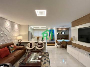 Sala · Apartamento à beira mar com 3 quartos (2 suítes), 4 vagas e lazer à venda em Pitangueiras, Guarujá
