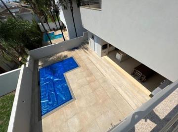 Casa · 410m² · 4 Quartos · 4 Vagas · Sobrado com 4 quartos à venda, 410 m² por R$ 3.100.000 - Condomínio Jardins Barcelona - Uberlândia/M