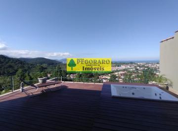Foto 02 · Casa à venda em Caraguatatuba-SP: 3 quartos, suíte, sala com vista para o mar e deck com hidro!