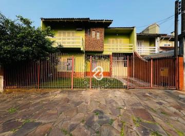 fc0f877f99ae74f5e291a6f3a4d6096d01520011 · Sobrado com 5 dormitórios à venda, 300 m² por R$ 430.000,00 - Três Portos - Sapucaia do Sul/RS