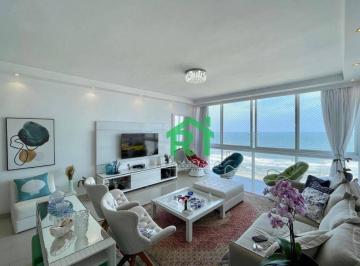 Sala · Apartamento frente mar com 4 quartos (4 suítes), 1 vaga à venda em Pitangueiras, Guarujá