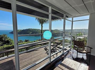 Casa · 600m² · 5 Quartos · 6 Vagas · Luxuosa Casa com Vista Panorâmica para o Mar na Praia da Ferradura - Exclusividade e Design Internac