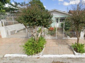 643272_ie5uS_64327266e47dcc51495.jpg · Terreno com casa de madeira.
