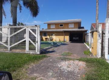 278823_ilV28Hu5E1HLkjXd8_278823642713066e1a0.jpg · Terreno com casa de madeira, 2 dormitórios, bairro Santa Luzia, Capão da Canoa.