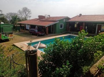 Foto 02 · Descubra o refúgio dos seus sonhos! Uma linda chácara de 1000m² com chácara com piscina no Altos da 