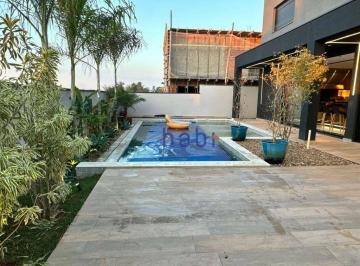 cd9b5d6cb9cc6c3dd869f863d8734fa7508a1664 · Casa com 5 dormitórios, 460 m² - venda por R$ 5.100.000,00 ou aluguel por R$ 35.000,02/mês - Condomí