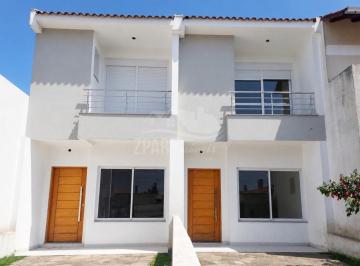 Foto 15 · Casa à venda na cidade de Porto Alegre-RS, bairro Guarujá: 3 suítes, 4 banheiros, 2 vagas de garagem